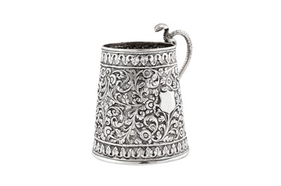 Lot 196 - A late 19th century Anglo – Indian unmarked silver christening mug, Cutch circa 1890