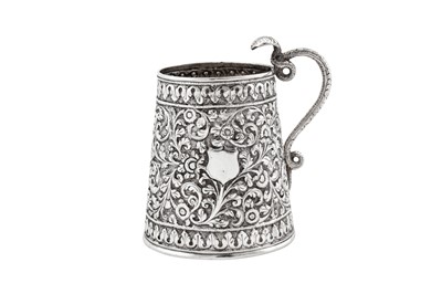 Lot 196 - A late 19th century Anglo – Indian unmarked silver christening mug, Cutch circa 1890