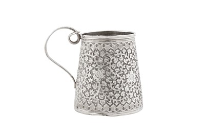 Lot 145 - An early 20th century Anglo – Indian unmarked silver christening mug, Kashmir circa 1910