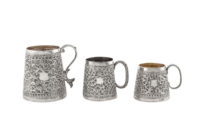 Lot 172 - Three early 20th century Anglo – Indian unmarked silver christening mugs, Bombay-Cutch circa 1910