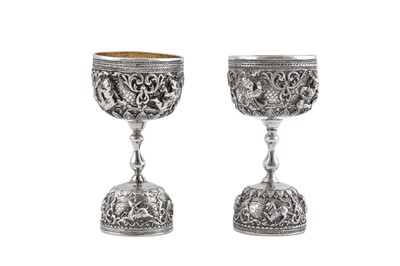 Lot 9 - Two early 20th century Burmese unmarked silver double spirit measures (jiggers), Rangoon circa 1920