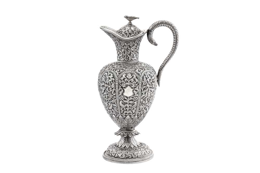 Lot 226 - A late 19th century Anglo – Indian unmarked silver claret jug or ewer, Cutch circa 1890