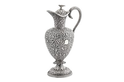 Lot 226 - A late 19th century Anglo – Indian unmarked silver claret jug or ewer, Cutch circa 1890
