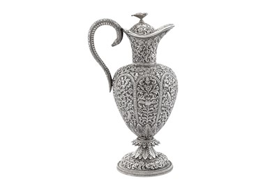 Lot 226 - A late 19th century Anglo – Indian unmarked silver claret jug or ewer, Cutch circa 1890