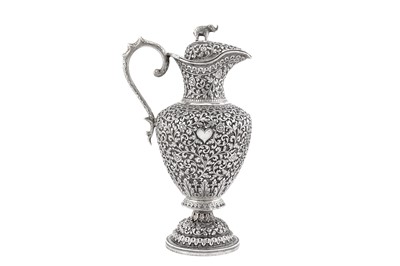 Lot 227 - A late 19th century Anglo – Indian unmarked silver claret jug or ewer, Cutch circa 1870