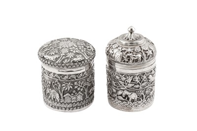 Lot 105 - Two late 19th / early 20th century Anglo – Indian unmarked silver dressing table jars, Lucknow circa 1900