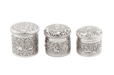 Lot 103 - Three late 19th / early 20th century Anglo – Indian unmarked silver dressing table jars, Lucknow circa 1900