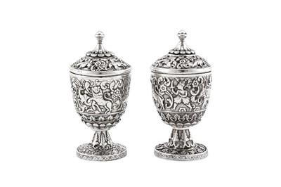 Lot 194 - A rare pair of mid - 19th century Anglo – Indian unmarked silver peppers, Cutch circa 1860