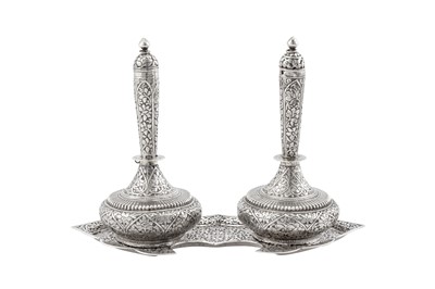 Lot 151 - A pair of late 19th / early 20th century Anglo – Indian unmarked silver bottles (surahi), Kashmir circa 1900