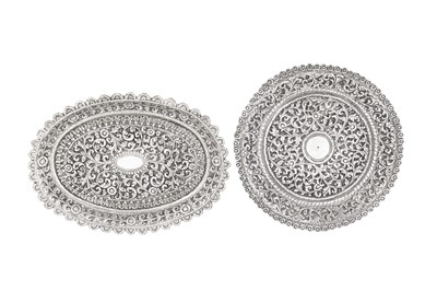 Lot 181 - Two small late 19th / early 20th century Anglo – Indian unmarked silver trays, Cutch circa 1900