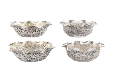 Lot 110 - Two pairs of early 20th century Anglo – Indian unmarked silver small bowls, Lucknow circa 1910