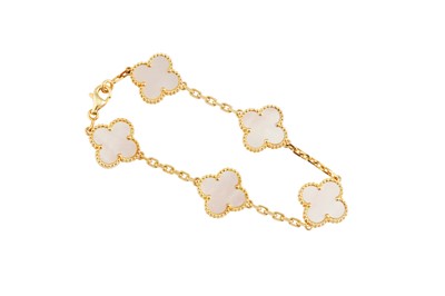 Lot 80 - Van Cleef & Arpels | A gold and mother-of-pearl 'Alhambra' bracelet
