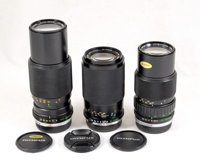 Lot 274 - A Group of Three Olympus OM Zoom Lenses.
