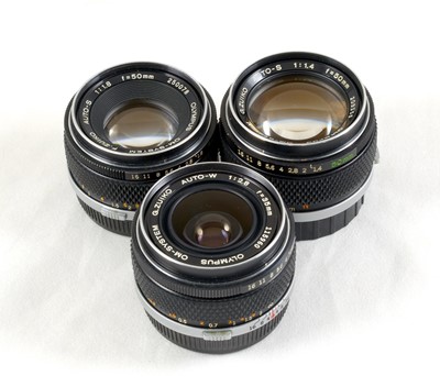 Lot 261 - Group of Three "Silver Nose" Olympus OM Lenses.