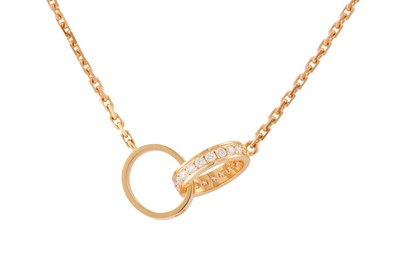Lot 89 - Cartier | A diamond-set 'Love' pendant necklace