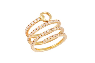 Lot 214 - Gucci | A gold and diamond coil ring