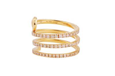 Lot 214 - Gucci | A gold and diamond coil ring