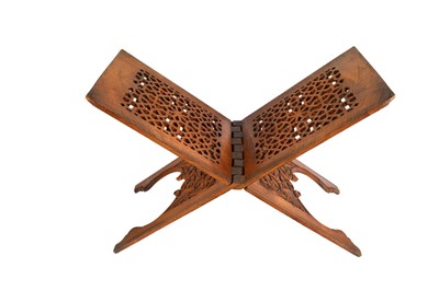 Lot 420 - A CARVED HARDWOOD FOLDING QUR'AN STAND