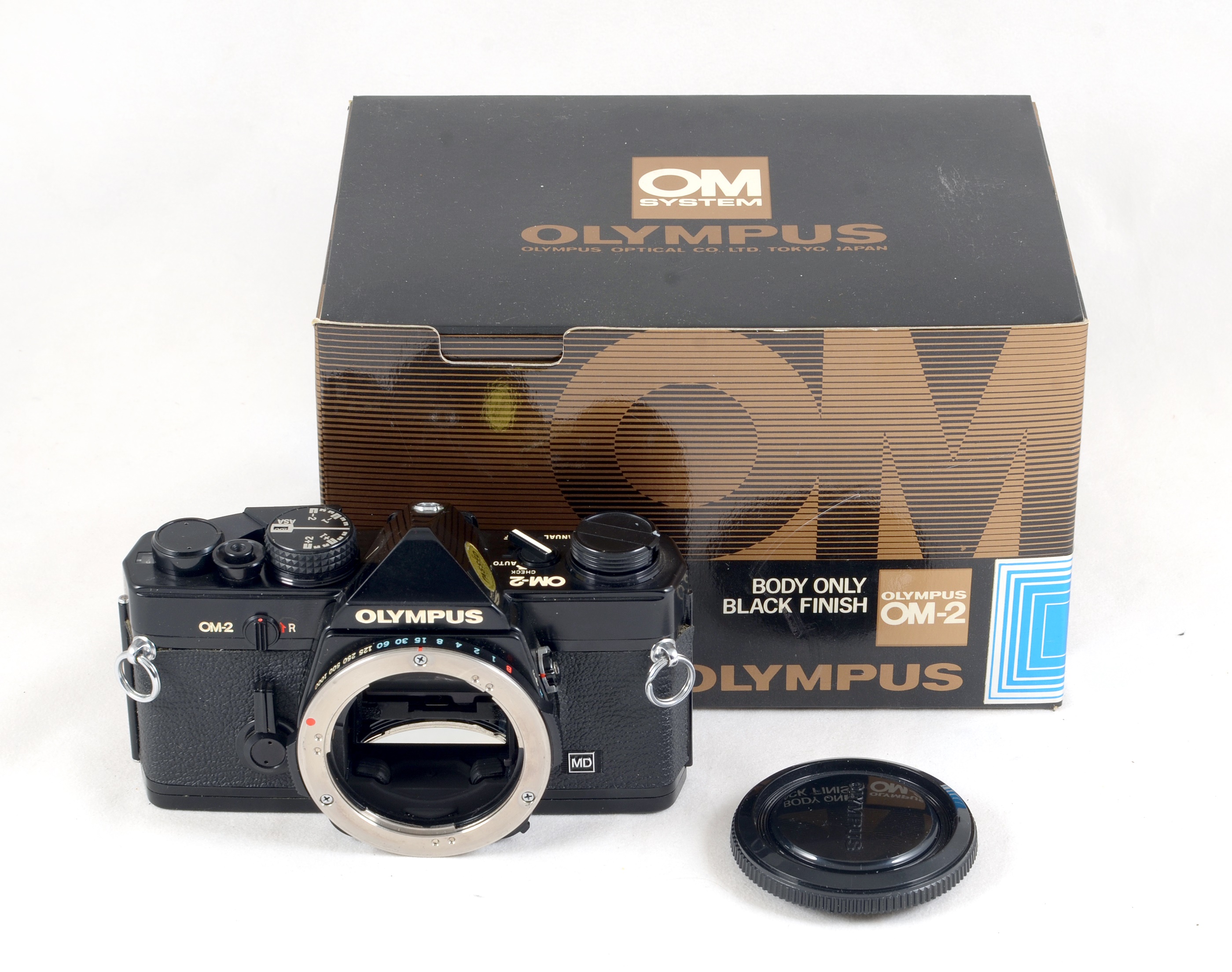 Lot 66 A Boxed, Black Olympus OM2MD Film Camera.