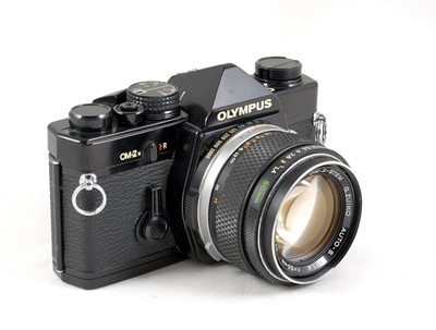 Lot 88 - Black Bodied Olympus OM-2n & f1.4 Lens