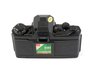 Lot 99 - A Boxed Olympus OM-3 Film Camera.