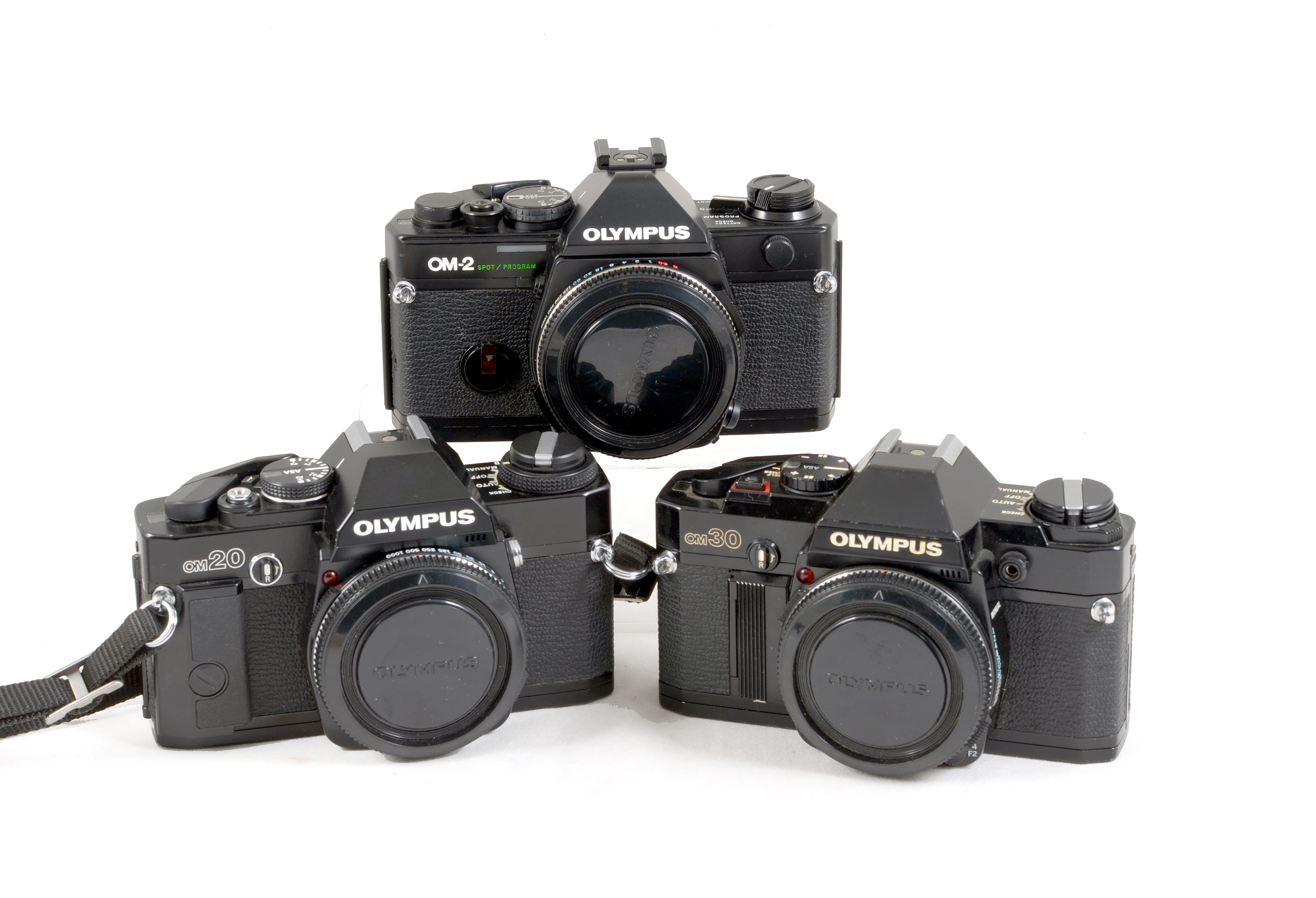 Lot 94 Three Black Olympus OM Film Cameras Bodies.