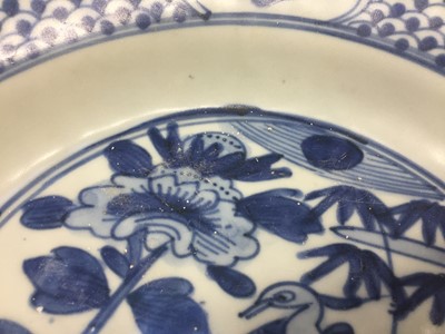 Lot 205 - A CHINESE SWATOW BLUE AND WHITE 'PHOENIX' DISH