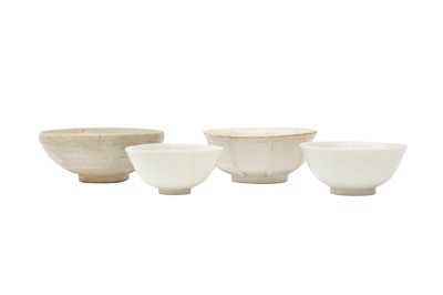 Lot 631 - A GROUP OF FOUR CHINESE WHITE-GLAZED CUPS