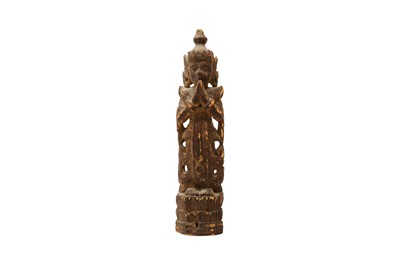 Lot 795 - A SOUTHEAST ASIAN WOOD FIGURE OF AN ACOLYTE