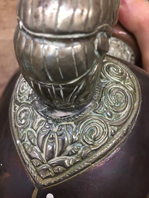 Lot 359 - A TIBETAN COPPER EWER