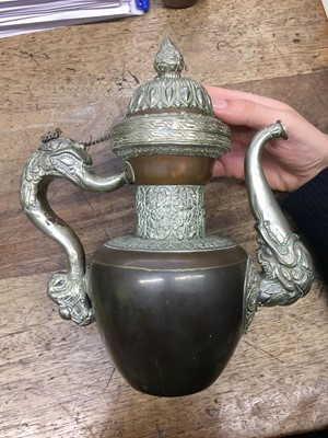 Lot 359 - A TIBETAN COPPER EWER