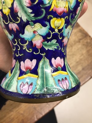 Lot 706 - A CHINESE CANTON-ENAMEL 'LOTUS' VASE