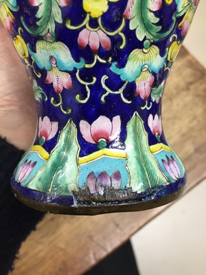 Lot 706 - A CHINESE CANTON-ENAMEL 'LOTUS' VASE