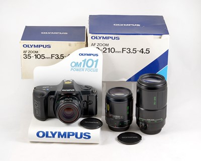 Lot 64 - An Olympus OM101 Power Focus Outfit.