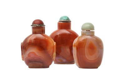 Lot 811 - A GROUP OF THREE CHINESE AGATE SNUFF BOTTLES