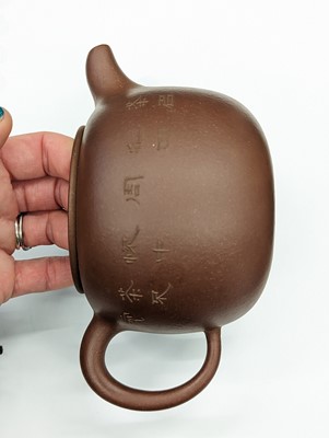 Lot 755 - A CHINESE YIXING ZISHA TEAPOT AND COVER