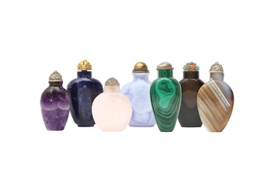 Lot 40 - A GROUP OF SEVEN CHINESE HARDSTONE SNUFF BOTTLES