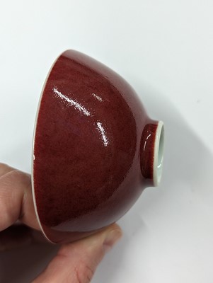 Lot 891 - A CHINESE COPPER RED-GLAZED CUP