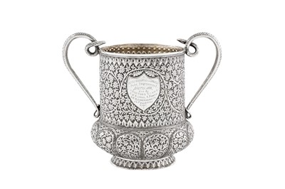 Lot 156 - A late 19th century Anglo – Indian unmarked silver twin handled cup, Kashmir dated 1886