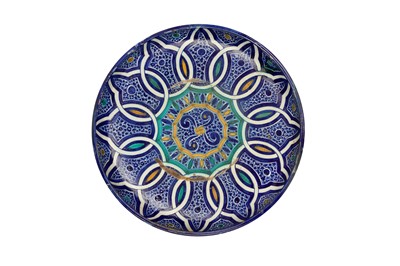 Lot 472 - FOUR MOROCCAN POLYCHROME-PAINTED POTTERY CHARGERS