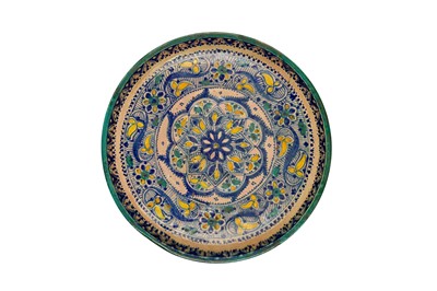 Lot 472 - FOUR MOROCCAN POLYCHROME-PAINTED POTTERY CHARGERS