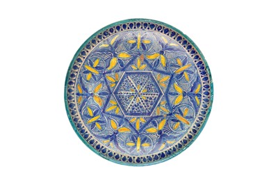 Lot 472 - FOUR MOROCCAN POLYCHROME-PAINTED POTTERY CHARGERS