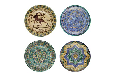 Lot 471 - FOUR MOROCCAN POLYCHROME-PAINTED POTTERY CHARGERS