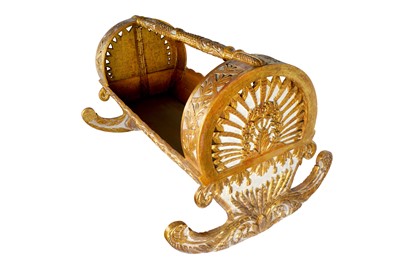 Lot 449 - AN OTTOMAN WHITE AND GOLD-PAINTED WOODEN CRADLE