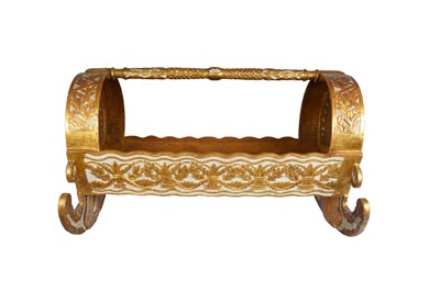 Lot 449 - AN OTTOMAN WHITE AND GOLD-PAINTED WOODEN CRADLE
