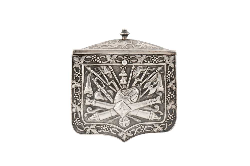 Lot 360 - A SILVER REPOUSSÉ GUNPOWDER CARTRIDGE CASE (PALASKA) WITH ARMORIAL DECORATION