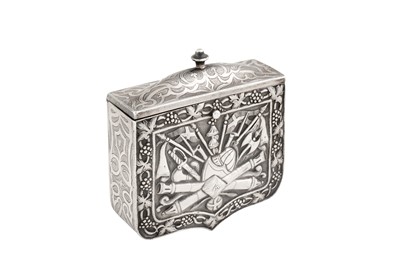 Lot 360 - A SILVER REPOUSSÉ GUNPOWDER CARTRIDGE CASE (PALASKA) WITH ARMORIAL DECORATION