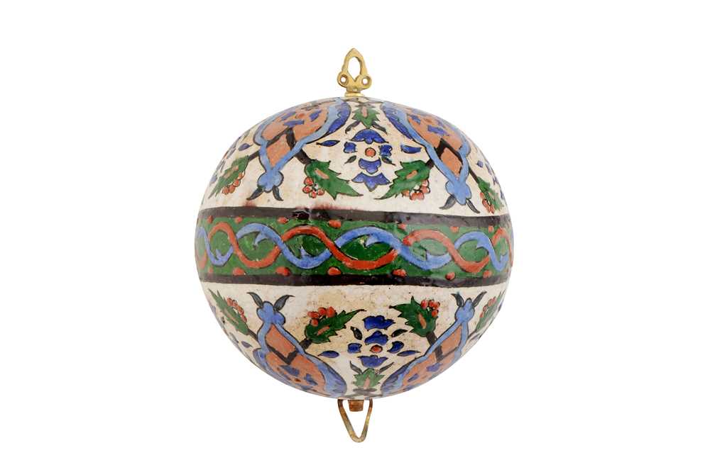 Lot 382 - A POLYCHROME-PAINTED KUTAHYA-STYLE POTTERY HANGING ORNAMENT