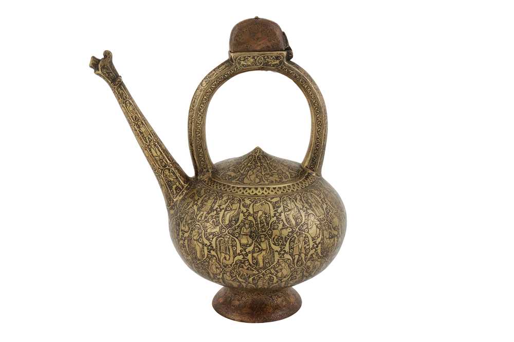 Lot 161 - A ZAND ENGRAVED BRASS 'KENDI' EWER WITH FIGURAL AND MYTHOLOGICAL DECORATION