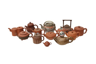 Lot 748 - A GROUP OF THIRTEEN YIXING ZISHA TEAPOTS AND COVERS